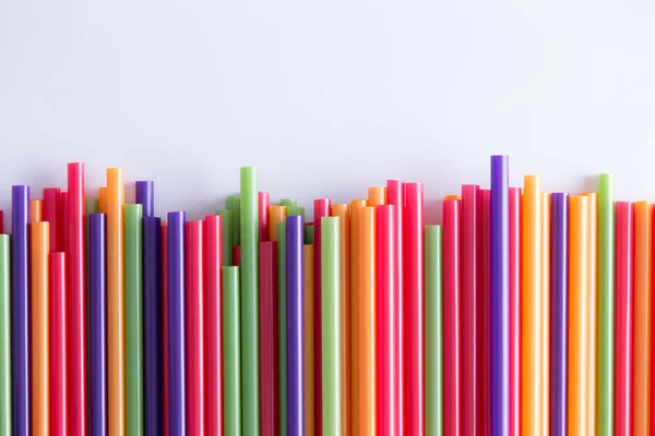 Multicolored drinking straws in a festive pattern — Stock Photo, Image