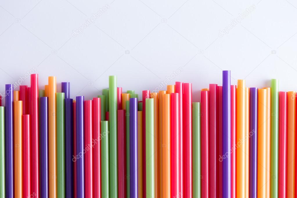 Multicolored drinking straws in a festive pattern