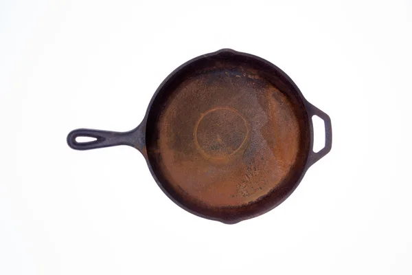 Старая ржавая круглая сковорода — стоковое фото