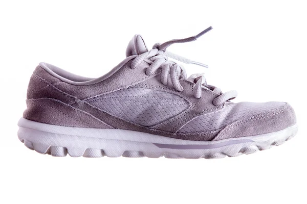 Licht gebruikt grijs sport schoen — Stockfoto