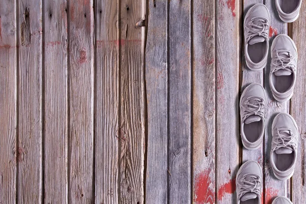 Shoe border on a wood background — Stock Photo, Image