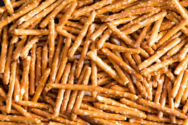 Plenty Salted Baked Pretzel Sticks for Backgrounds — Stock Photo, Image