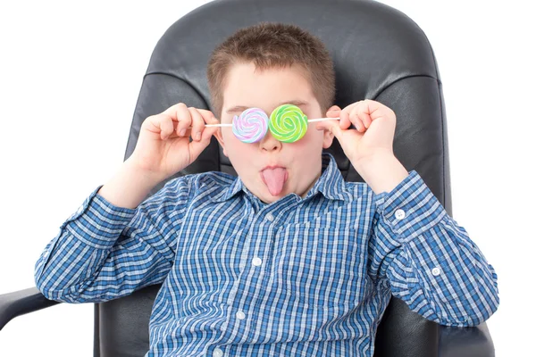 Funny Boy with Lollipops Over his Two Eyes — Stock Photo, Image