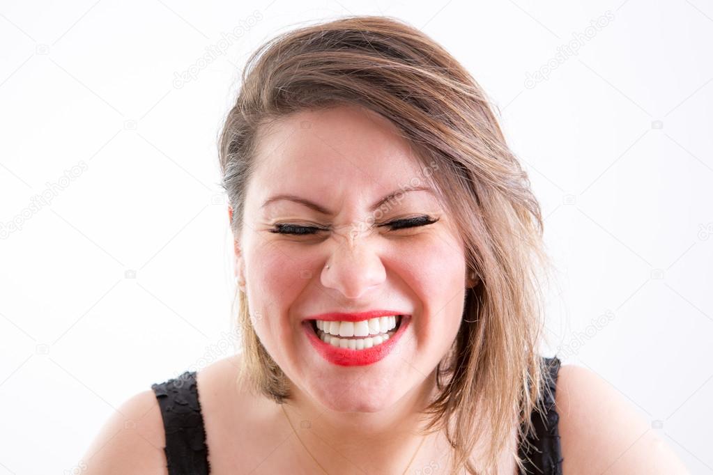 Woman Face in Toothy Laugh with Eyes Closed