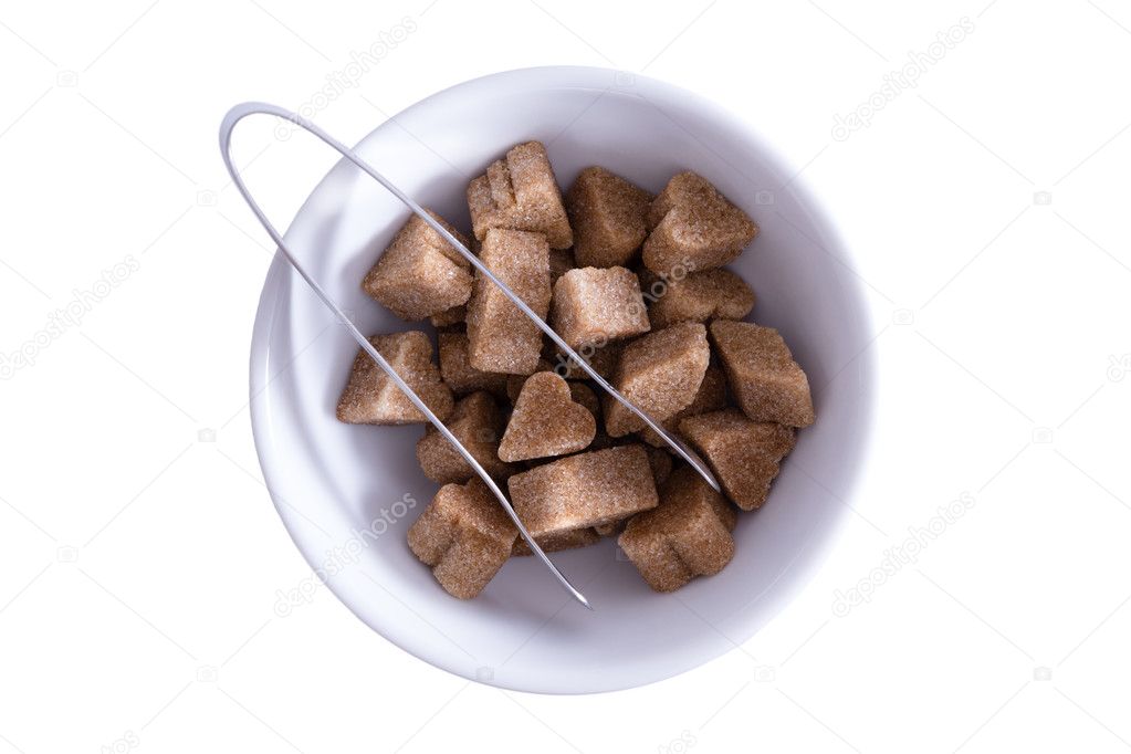 Brown sugar cubes in a bowl