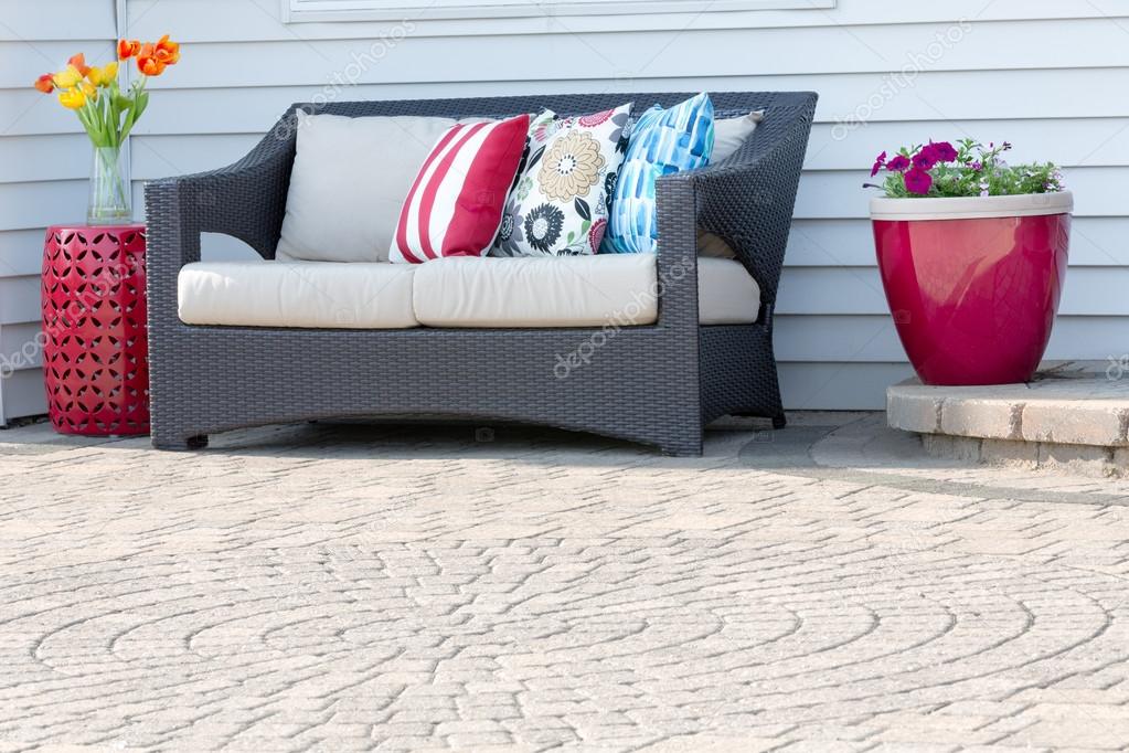 Comfortable modern settee on an outdoor patio