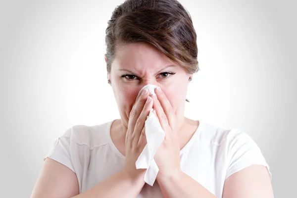 Middle Age Lady Blowing Her Nose too hard — Stock Photo, Image
