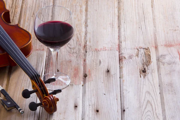 Violin and Wine on Wooden Floor with Copy Space — Stock Photo, Image