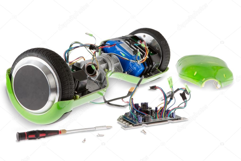 Disassembled Electric Skateboard with Screwdriver