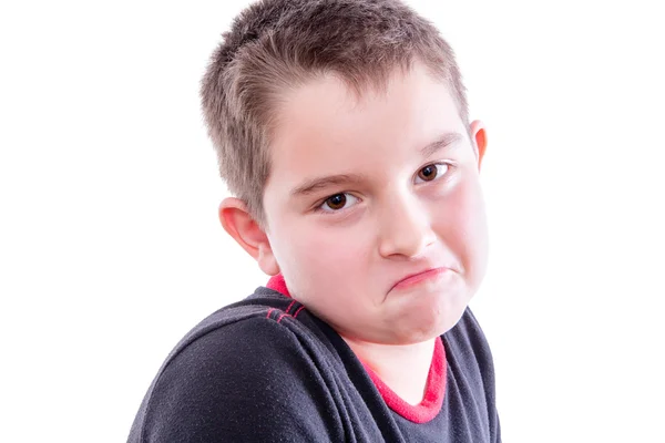 Portrait of Boy Frowning in White Studio — Stock Photo, Image