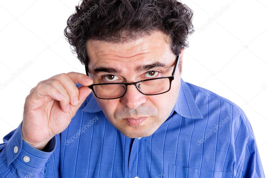 Man with Eyeglasses Looking at Camera Seriously