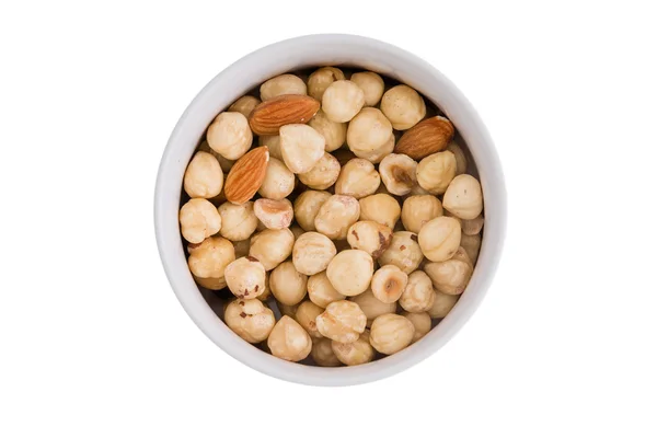 Ramekin of fresh hazelnuts and almonds — Stock Photo, Image