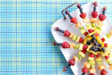 Fresh healthy tropical fruit shish kebabs