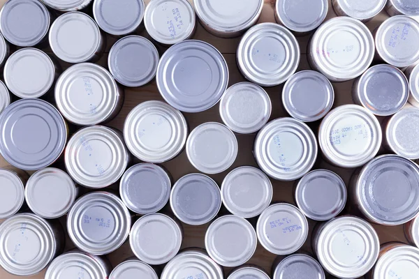 Antecedentes de várias latas de alimentos seladas — Fotografia de Stock