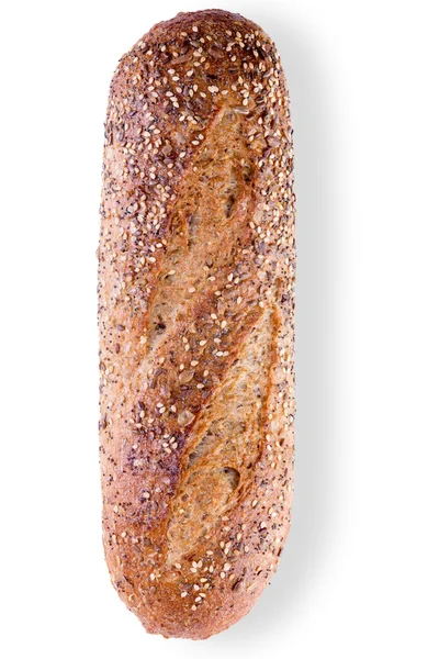 Loaf of crusty wholegrain bread with seeds — Stock Photo, Image