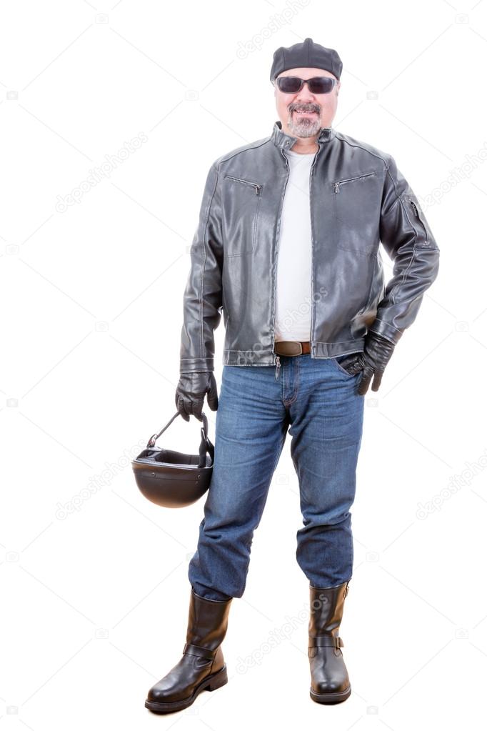 Tough smiling motorcyclist standing over white