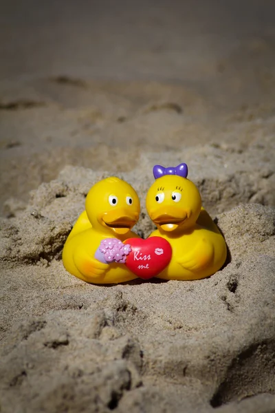 Rubber ducks on sand — Φωτογραφία Αρχείου