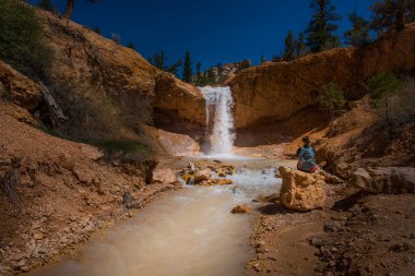 Hiker at Mossy Cave Trail Bryce Canyon clipart