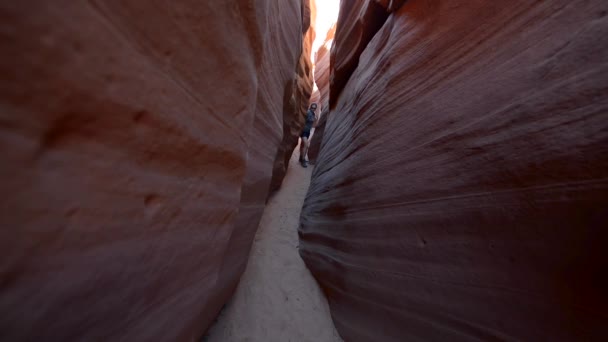 Girl Hiker Backpacker in the Slot Canyon