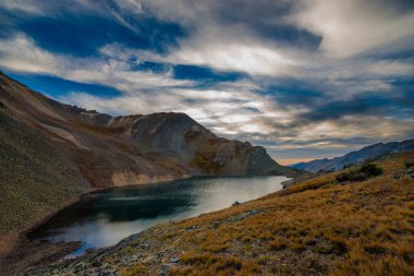 Crystal Lake at Sunset Ophir Pass Colorado clipart