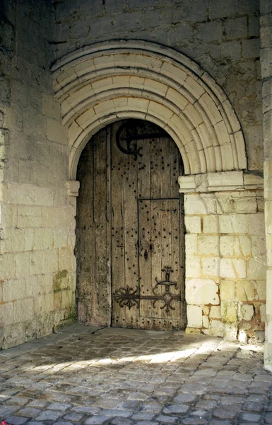 Arched door at Fontevraud church — Stock Photo, Image