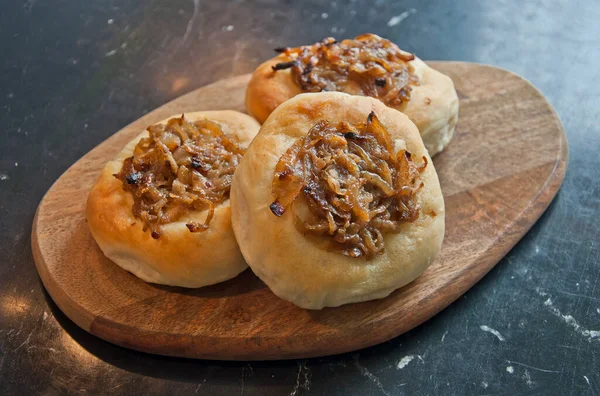 Bunch Tasty Home Made Onion Rolls Wooden Plate — Stock Photo, Image