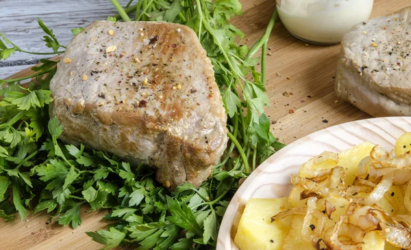 Fried steak with olive oil and spices — Stock Photo, Image