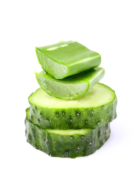 Leaves of aloe Vera and two slices of cucumber. — Stock Photo, Image