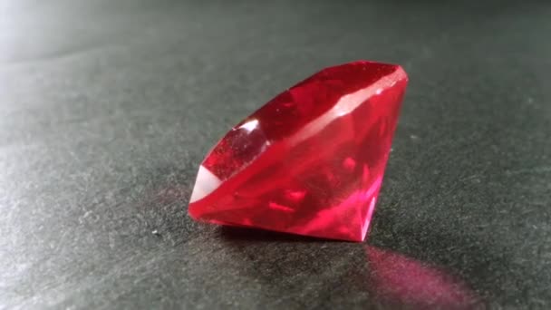 Clear transparent red ruby stone. Macro rotating filming of precious crystals. — Stock Video