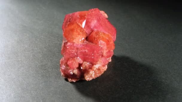Reb ruby stone. Uncut raw precious jewel before finishing. Vivid mineral crystal — Stock Video