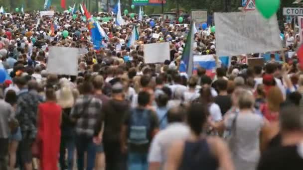 National disorder trouble with crowds of marching protest activists on streets. — Stock Video