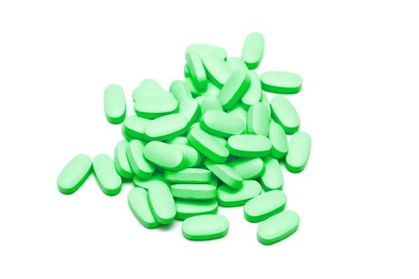 Zöld tabletták fehér — Stock Fotó