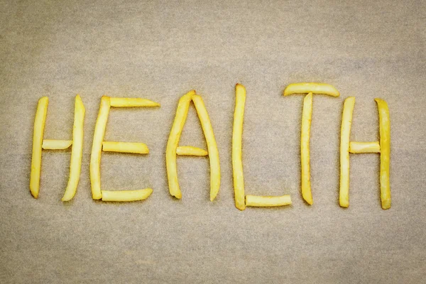 French fries inscription Health — Stock Photo, Image