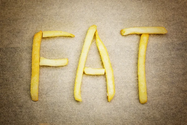 Concepto de salud con inscripción de papas fritas FAT — Foto de Stock