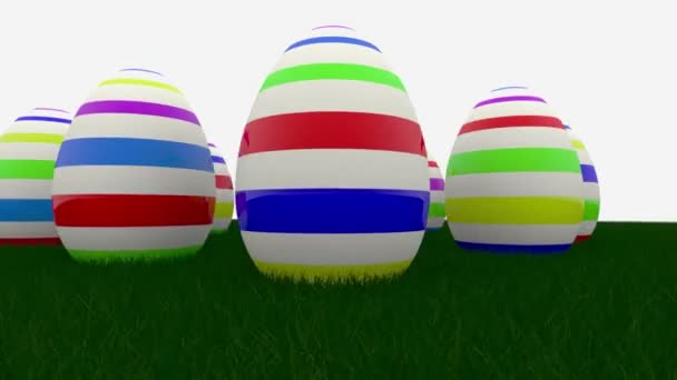 Uova di Pasqua con strisce su erba verde — Video Stock