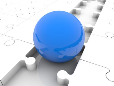 Puzzle parçaları arasında mavi topu 