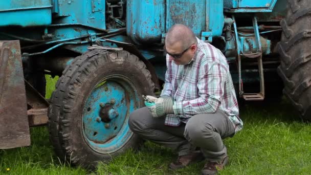 Worker with adjustable wrench fix the nut — Stock Video