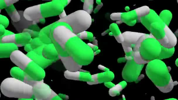 Flying pills in white and green colors on black — Stock Video