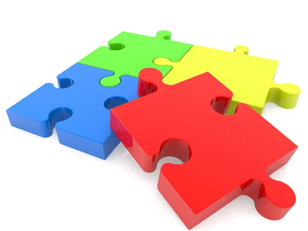 Four puzzle pieces in various colors — Stock Photo, Image