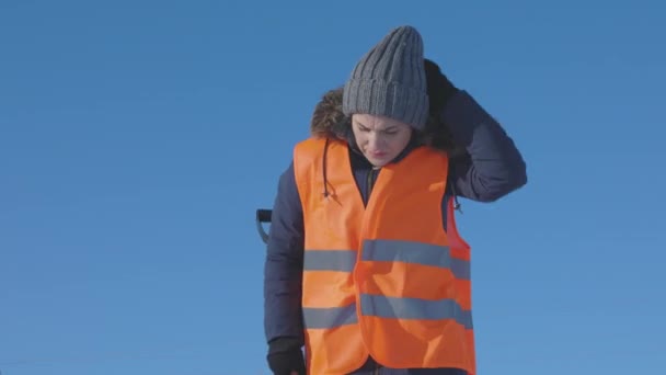 Woman Janitor Using Snow Shovel — Stock Video