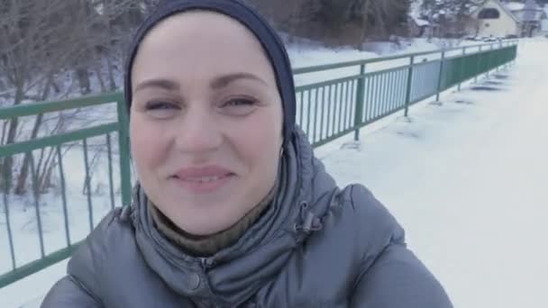 Woman Holding Camera Spinning Winter — Stock Video