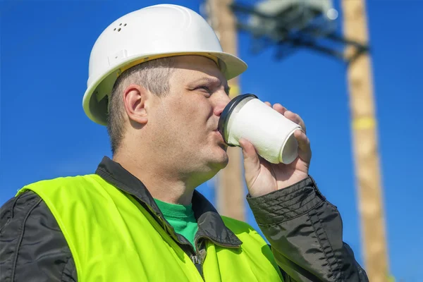 Electrician Engineer drinking — Stock Photo, Image