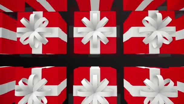 Cajas de regalo rojas en filas sobre fondo blanco — Vídeos de Stock