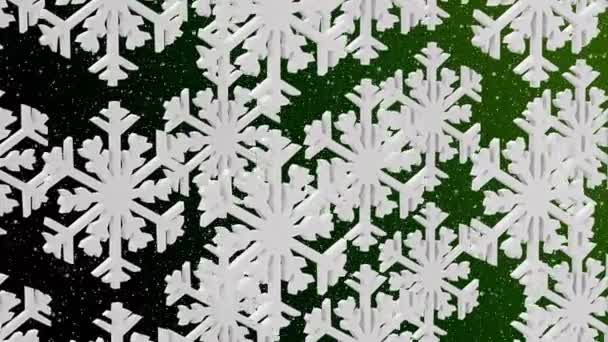 Copos de nieve blancos sobre un fondo verde — Vídeos de Stock