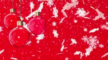 Kırmızı arka planda noel süslemeleri