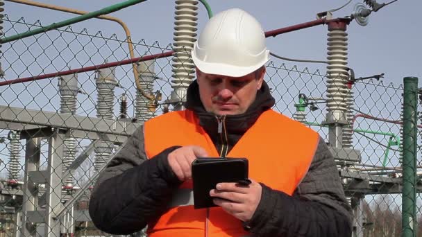 Electrical engineer with tablet PC at power plant — Stock Video
