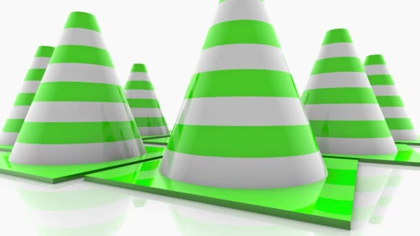 Traffic cones with green stripes on white — Stock Video