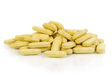beyaz zemin üzerine Vitamin hapı