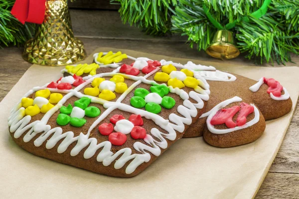 Christmas gingerbreads on paper — Stock Photo, Image