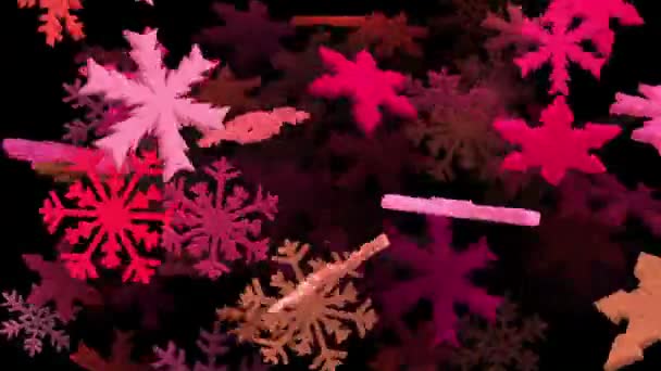 Flocons de neige en différentes couleurs sur noir — Video